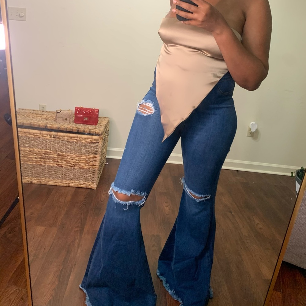 High waisted distress denim jeans